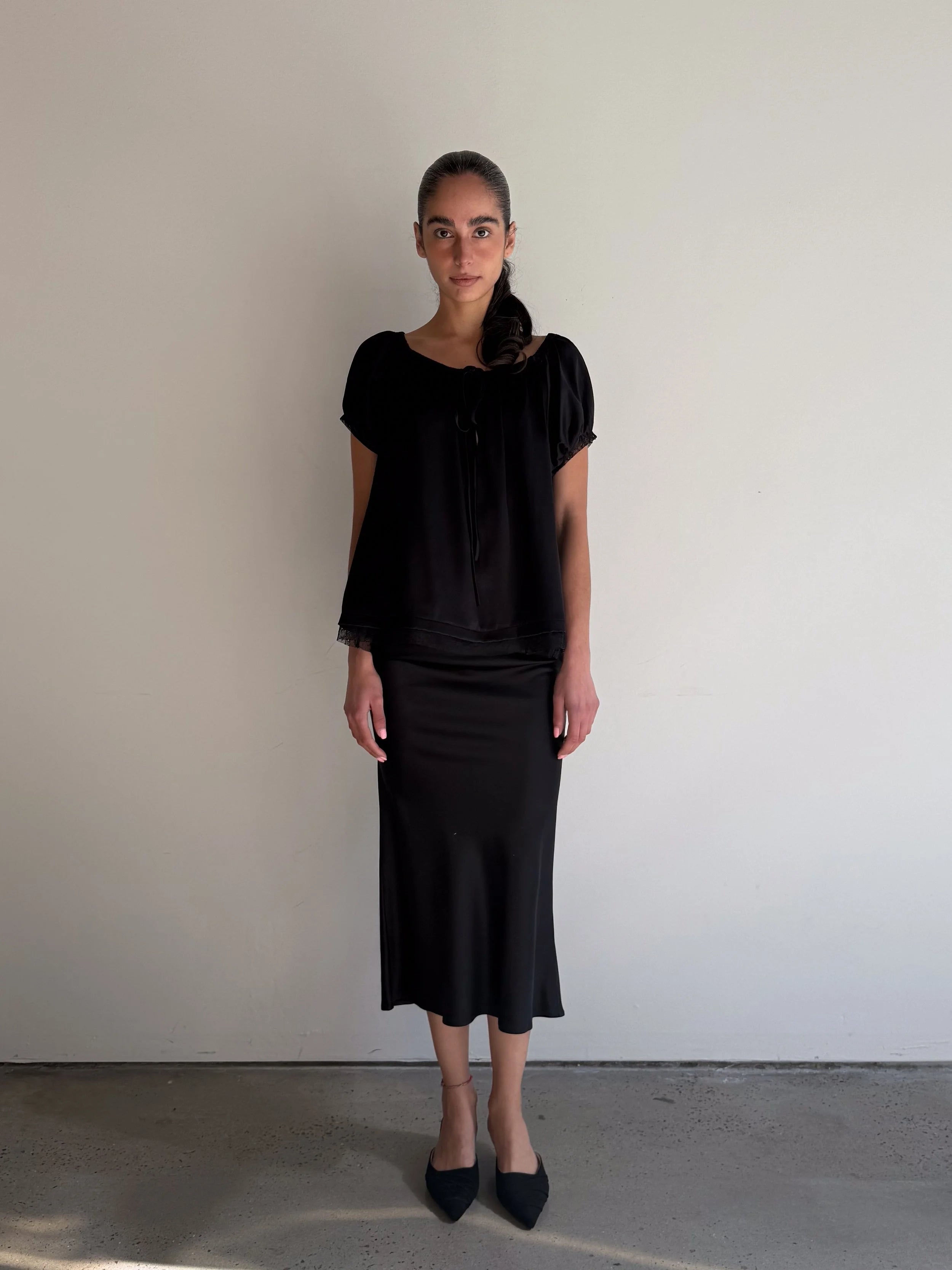 Veil Midi Satin Skirt in Black