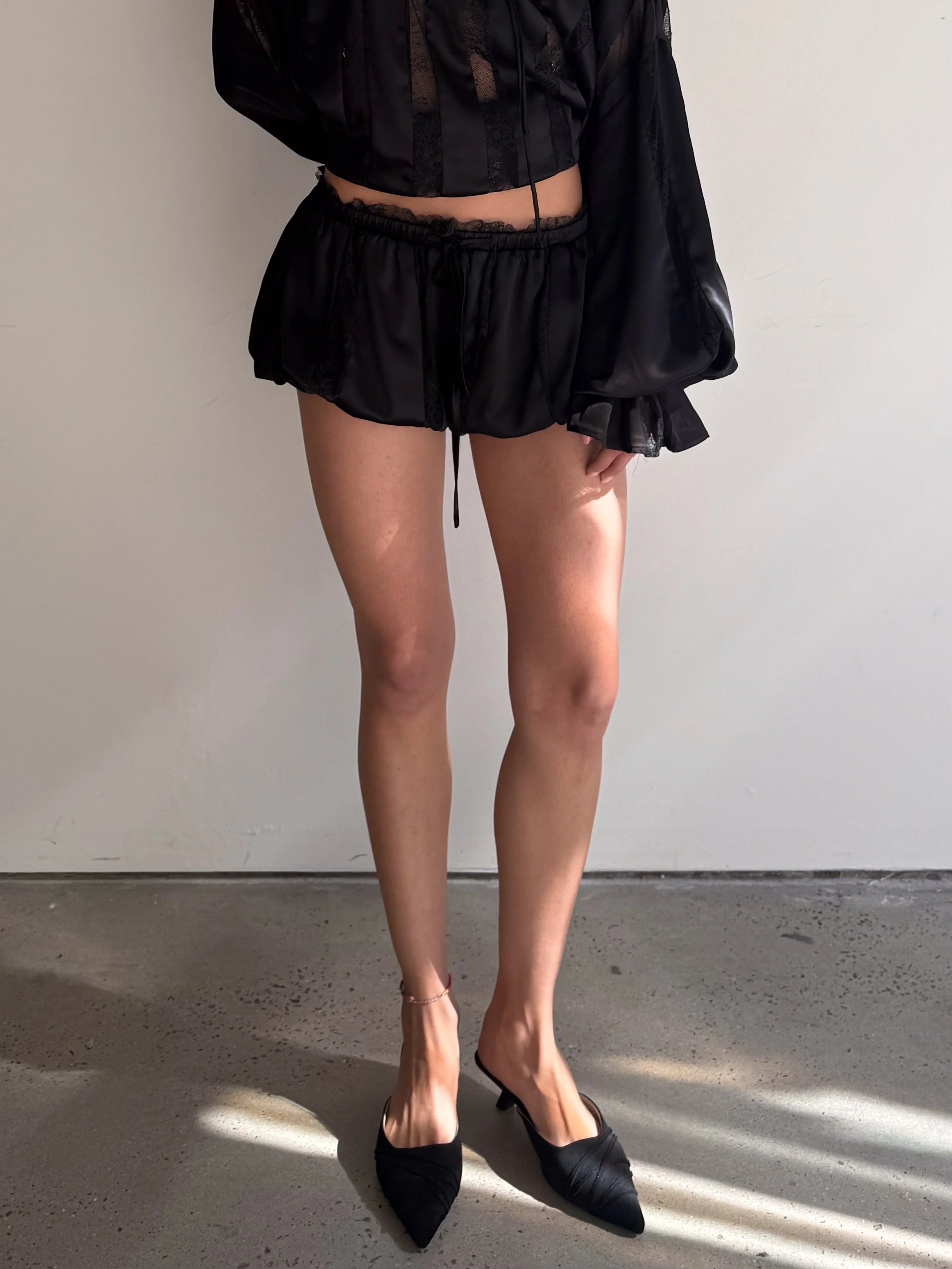 Muse Lace & Satin Panelled Bubble Shorts in Black