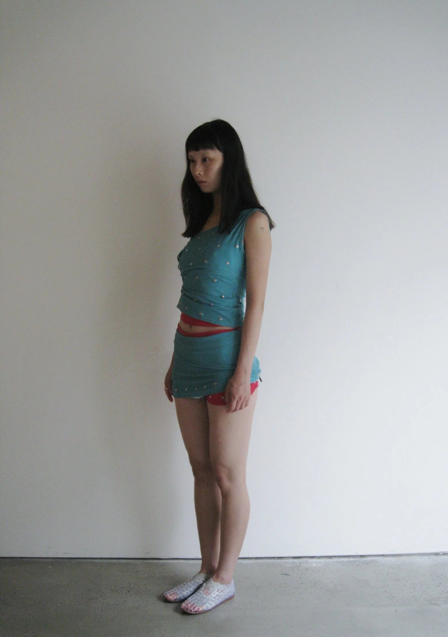 SENSITIVE® Mini Skirt with Rivets in Aqua
